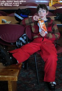 An image of Luke having a snack in the Midway Lodge at Stowe Mountain Ski Resort in Vermont