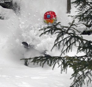 An image of Dylan skiing deep powder in the KP Glades area at Bolton Valley Ski Resort in Vermont