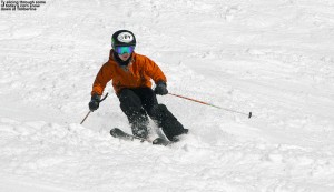 An image of Ty skiing in spring corn snow on the Spell Binder trail in the Timberline area at Bolton Valley Resort in Vermont