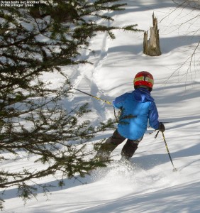 An image of Dylan skiing some spring snow in the Villager Trees at Bolton Valley Resort in Vermont