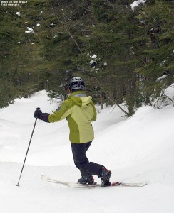An image of Erica Telemark skiing on the Bruce Trail near Stowe Mountain Resort in Vermont