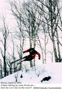 An image of Jay jumping off the side of the trail on skis at Stowe Mountain Ski Resort in Vermont
