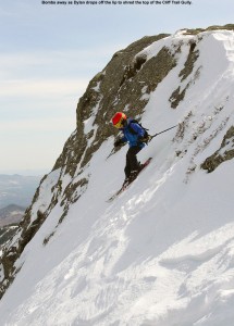 An image of Dylan dropping into a steep line on his skis in the Cliff Trail Gully in the alpine terrain above Stowe Mountain Ski Resort in Vermont