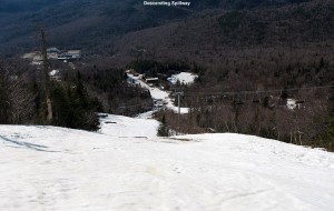 An image looking down the Spillway trail at Bolton Valley Ski Resort in Vermont on a sunny spring afternoon