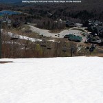 an image looking down toward the steep pitch of the West Slope trail at Stowe Mountain Ski Resort in Vermont  on a day of spring skiing in May