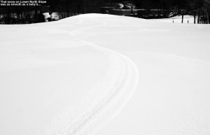 An image of ski tracks on the Lower North Slope trail at Stowe Mountain Resort in Vermont