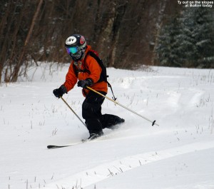 An image of Ty skiing in powder on the Turnpike trail at Bolton Valley Ski Resort in Vermont
