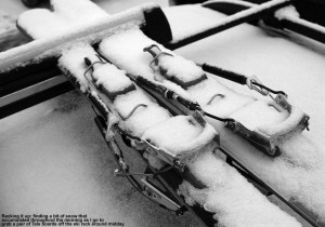 An image of Telemark skis with snow on them on a car ski rack at Stowe Mountain Ski Resort in Vermont
