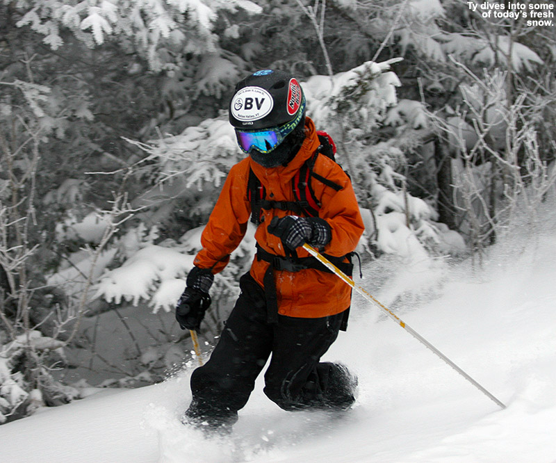 An image of Ty Telemark skiing in powder snow on the Cougar trail at Bolton Valley Resort in Vermont