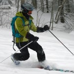 An image of Erica Telemark skiing in a bit of lightly tracked powder on the Lower Turnpike trail at Bolton Valley Resort in Vermont
