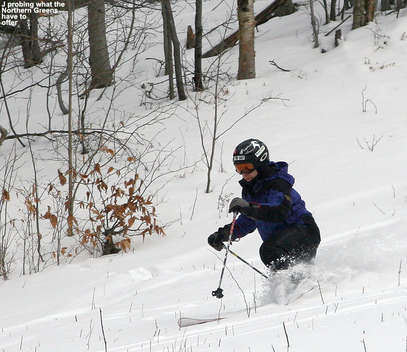 An image of Jay Telemark skiing in powder on the Spell Binder trail at Bolton Valley Resort in Northern Vermont