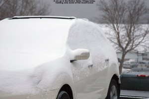 An image of a snow-covered car at Bolton Valley Ski Resort in Vermont