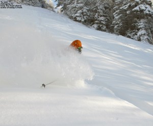 An image of Ty skiing deep powder on the Cougar trail at Bolton Valley Resort in Vermont