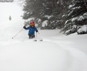 An image of Dylan skiing powder on the Wilderness Lift Line at Bolton Valley Resort in Vermont