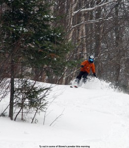 An image of Ty skiing powder on the Lower Tyro trail at Stowe Mountain Resort in Vermont