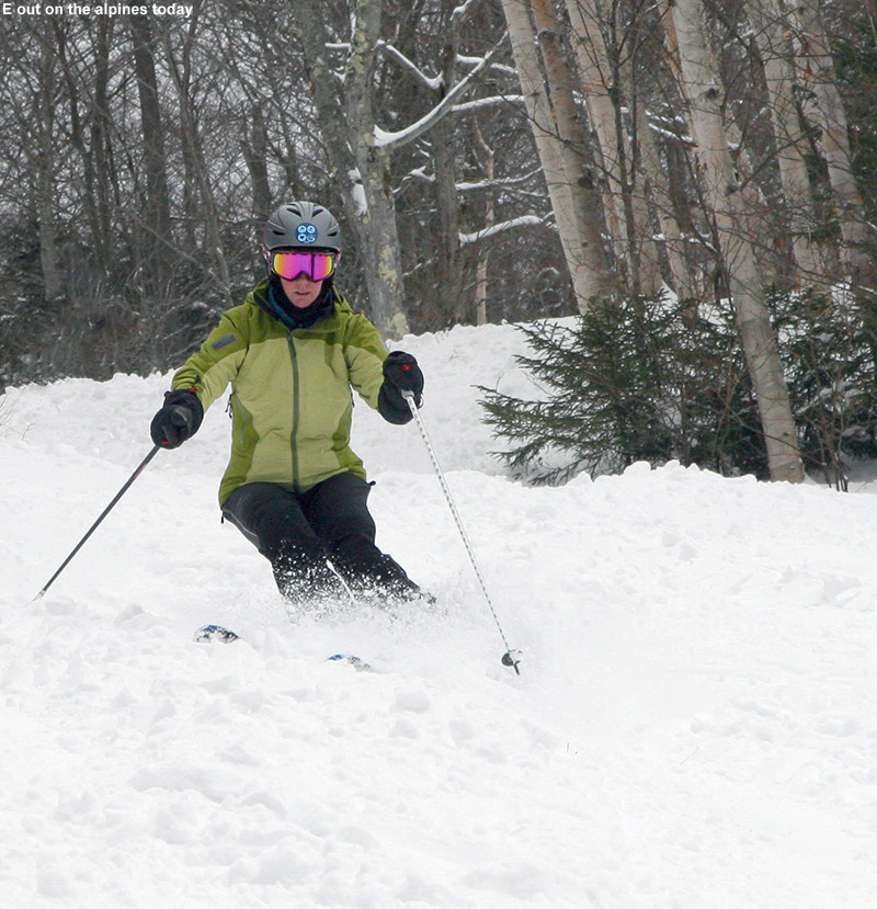 An image of Erica skiing soft snow on the Lower Tyro trail at Stowe Mountain Resort in Vermont