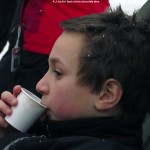 An image of Kenny drinking some hot chocolate after ski school program at Stowe Mountain Resort in Vermont