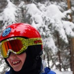An image of Dylan smiling at the top of the Glades Right trail at Bolton Valley Ski Resort in Vermont
