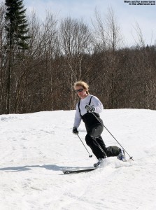 An image of Erica Telemark skiing on the Interstate trail at Jay Peak Ski Resort over Mother's Day weekend 2014.