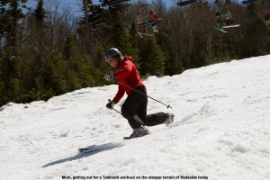 An image of Erica Telemark skiing on the Jet trail at Jay Peak ski resort in Vermont on Mother's Day