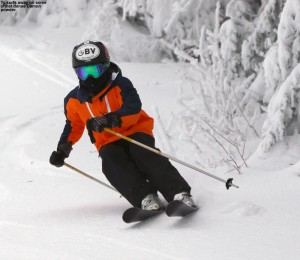 An image of Ty skiing dense snow left by Winter Storm Damon at Bolton Valley Resort in Vermont