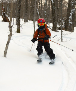 An image of Dylan skiing in some powder snow out in the Vermont backcountry in Big Jay Basin