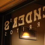 An image of the window sign for Bender's Burritos in Stowe Vermont taken from the inside