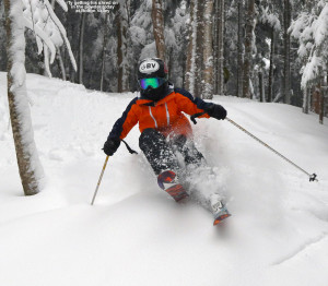 An image of Ty skiing in the glades at Bolton Valley Ski Resort in Vermont