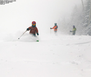 An image of Dylan skiing in powder snow on the Tattle Tale trail at Bolton Valley Ski Resort in Vermont