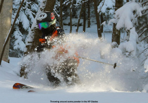 An image of Ty spraying some powder snow in the KP Glades area of Bolton Valley Ski Resort in Vermont