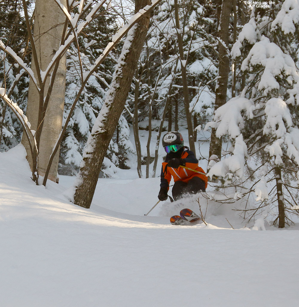 An image of Ty skiing powder snow in the KP Glades area of Bolton Valley Ski Resort in Vermont