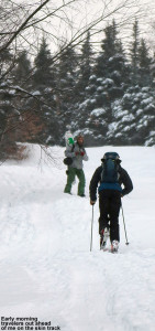 An imae of two hikers ascending the Twice as Nice trail at Bolton Valley Ski Resort in Vermont
