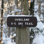 An image of the Overland Cross-Country Ski Trail sign near the Stevensville parking lot outside Underhill Center in the Green Mountains of Vermont