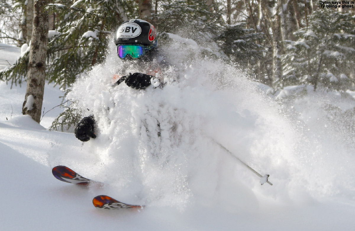 An image of Ty covered in powder while skiing in the Hazelton Zone at Stowe Mountain Resort in Vermont after Winter Storm Pandora dropped 9 inches of snow