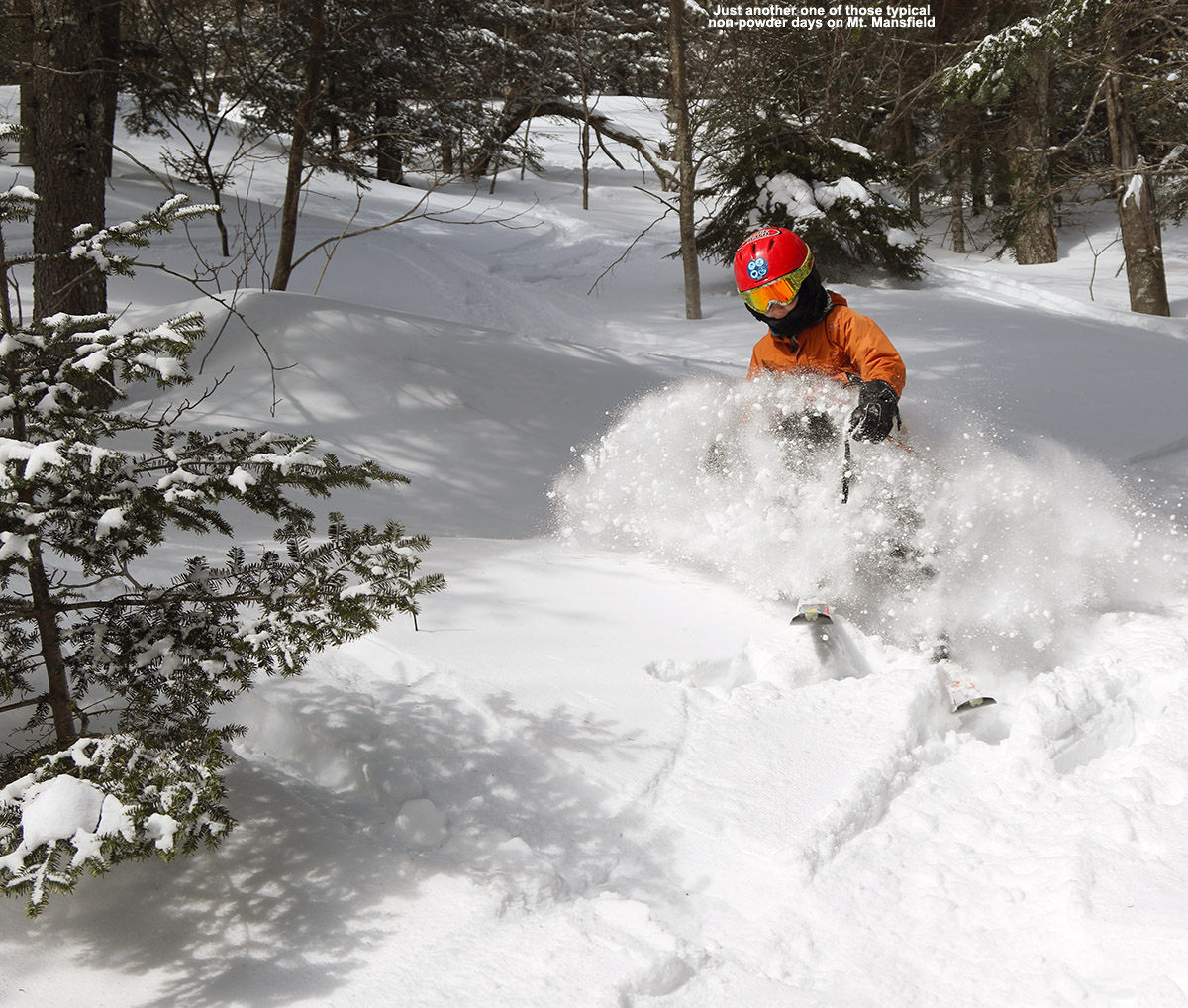 An image of Dylan skiing powder snow out near the Angel Food area of Stowe Mountain Resort in Vermont