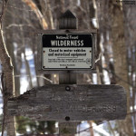 An image of a sign marking the boundary of the Breadloaf Wilderness Area in Vermont