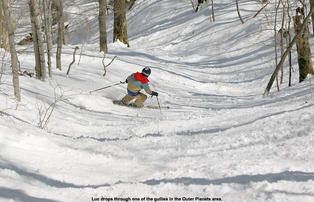 An image of Luc skiing in the Outer Planets area at Stowe Mountain Resort in Vermont