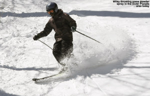 An image of Wiley skiing some powder in the Outer Planets area outside of Stowe Mountain Resort in Vermont