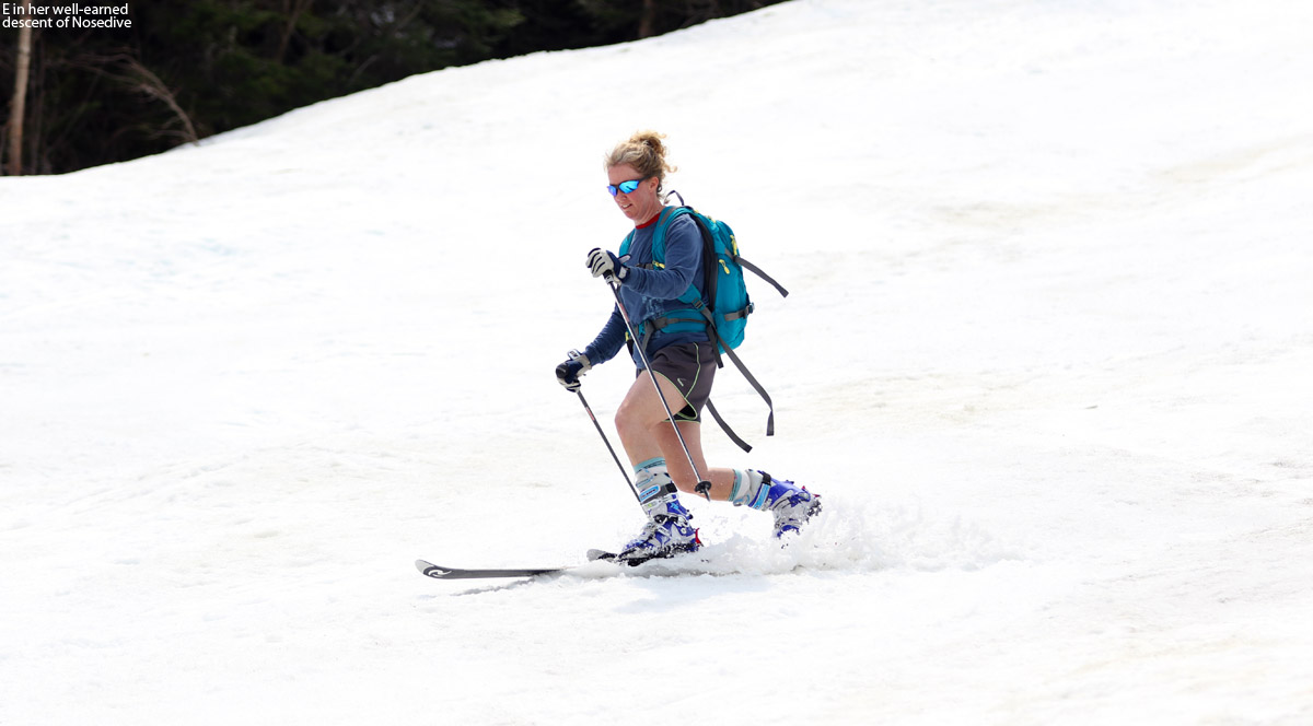 An image of Erica Telemark skiing on the Nosedive trail at Stowe Mountain Resort in Vermont in May