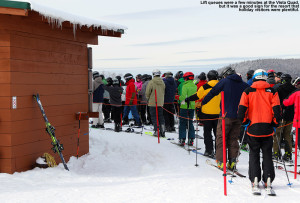 An image of skiers in a lift queue at Bolton Valley Resort in Vermont