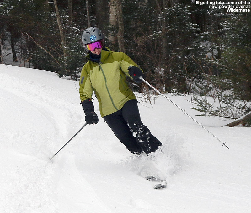 An image of Erica skiing powder snow along the edge of the Liftline Trail in the Wilderness are of Bolton Valley Ski Resort in Vermont