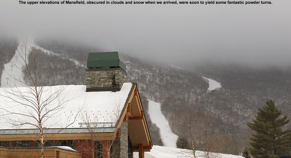 An image of Mt. Mansfied with clouds on the upper mountain at Stowe Mountain Resort in Vermont