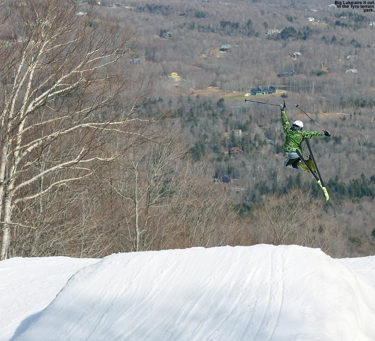 An image of Luke in the air after a jump in the Tyro Terrain Park at Stowe Mountain Resort in Vermont