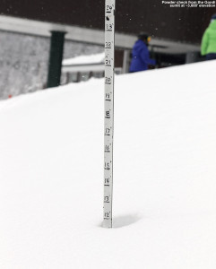 An image showing a depth measurement of a foot of powder at the top of the Gondola at Stowe Mountain Resort in Vermont