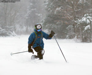 An image of Ty Telemark skiing in powder on the Cougar trail at Bolton Valley Resort in Vermont