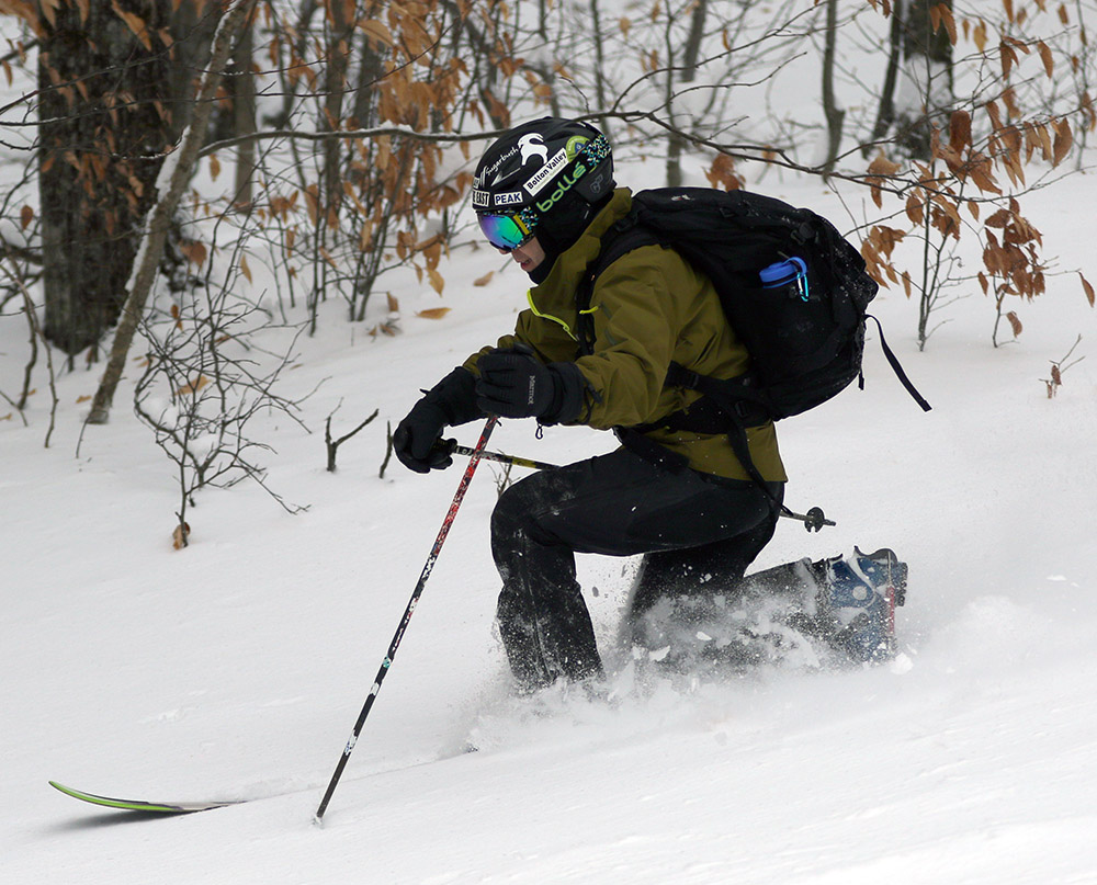 An image of Jay Telemark skiing at Bolton Valley Ski Resort in Vermont