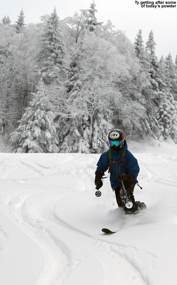 An image of Ty Telemark skiing in powder at Bolton Valley Resort in Vermont