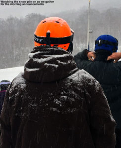 An image of snow building up on a skier during a snowstorm at Stowe Mountain Resort in Vermont