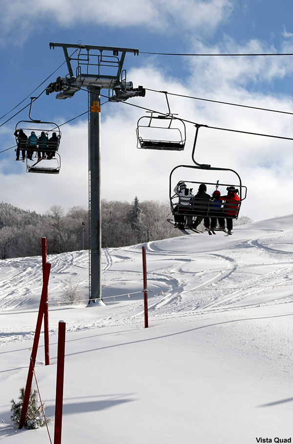 An image of the Vista Quad chairlift at Bolton Valley Ski Resort in Vermont