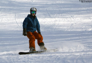 An image of Ty snowboarding at Bolton Valley Ski Resort in Vermont